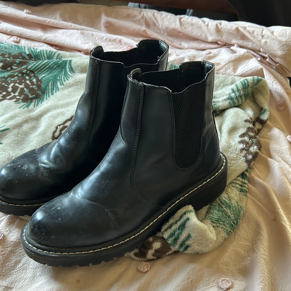 Size 10 combat boots never worn before. Great condition as well as quality!